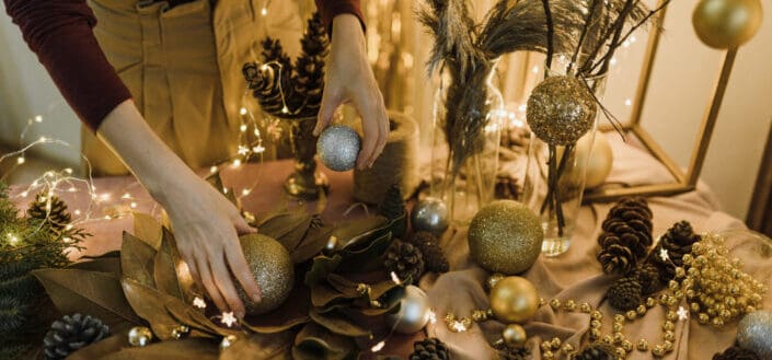 woman's hand fixing christmas decorations