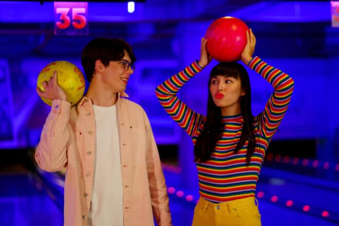couple playing retro bowling - minute to win it games for teens