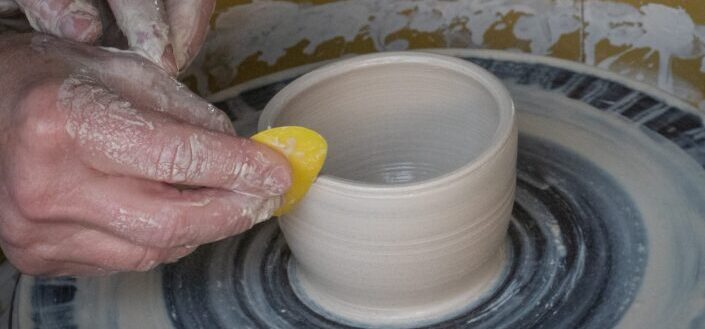 Man making a clay pot