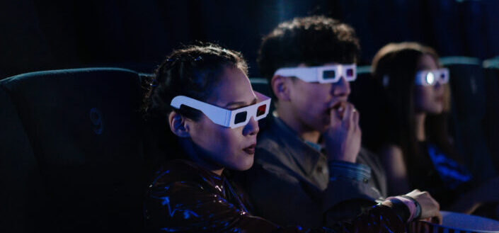 Group of people watching a 3D movie
