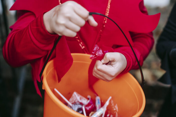 Kid holding candies