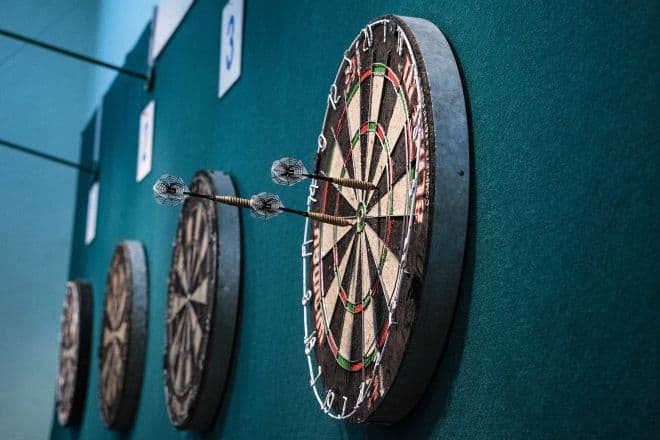 Pile of Dartboards Hanging on The Wall - Dart Games