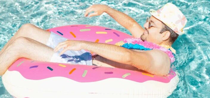 Man on donut swim ring